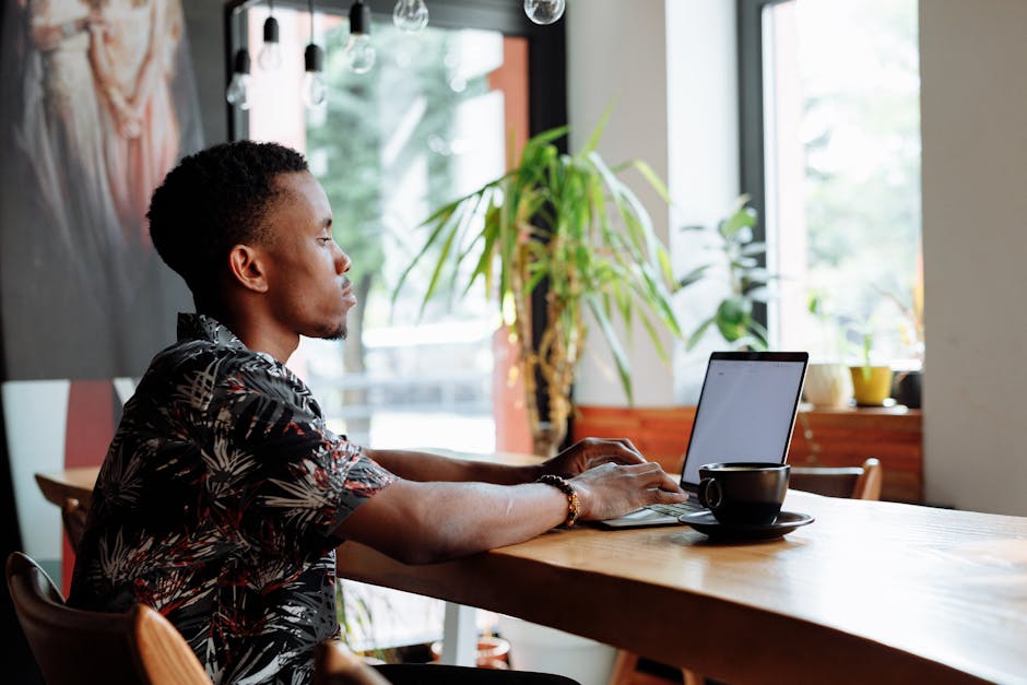 person-laptop-coffee-shop
