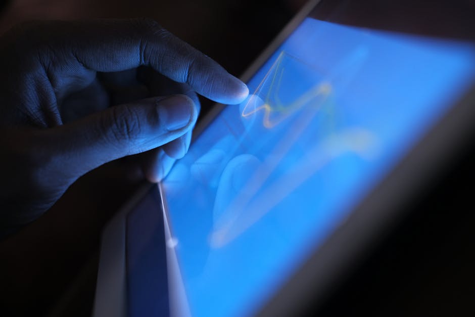 person-using-digital-tablet
