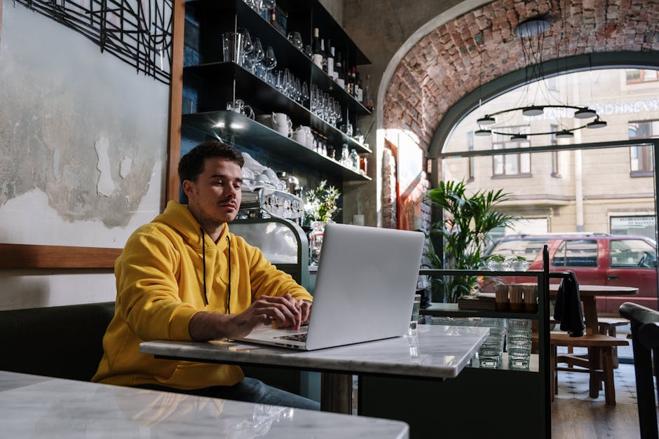 person-laptop-coffee-shop
